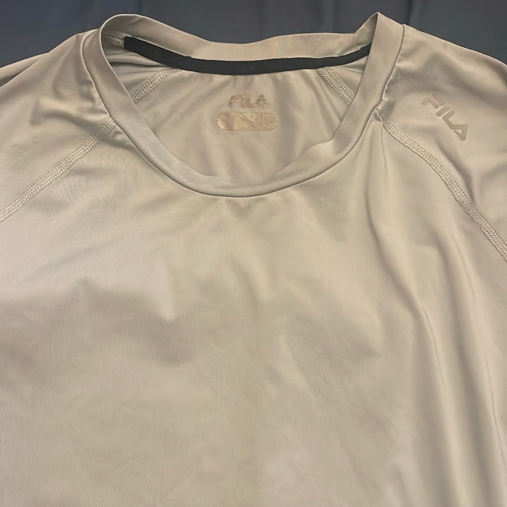 Long sleeve fila sports shirt used in great condition